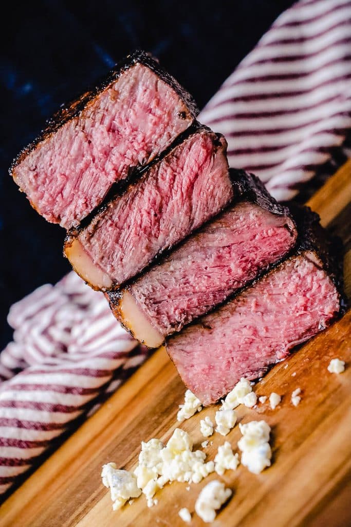 Strip steak cut in half and stacked up