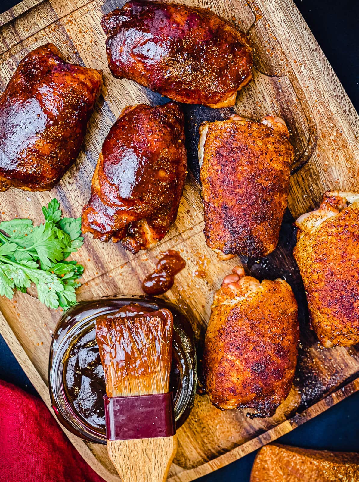 smoked chicken thighs on a serving platter