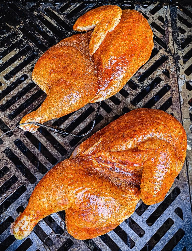 chicken halves on the grill
