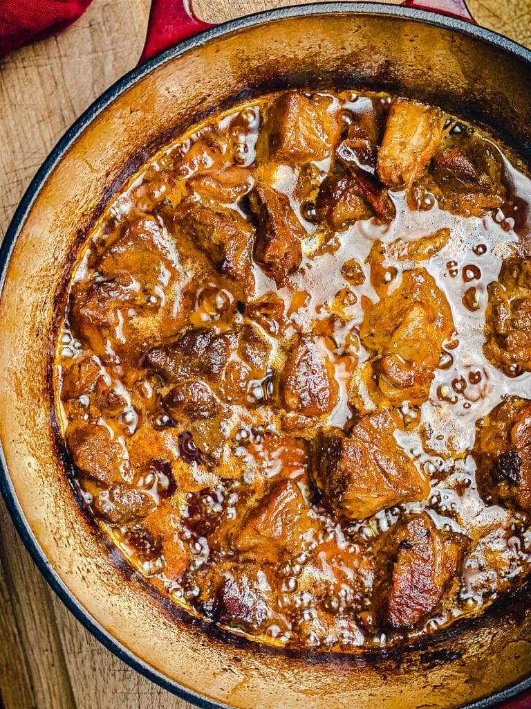 grilled pork carnitas in a dutch oven