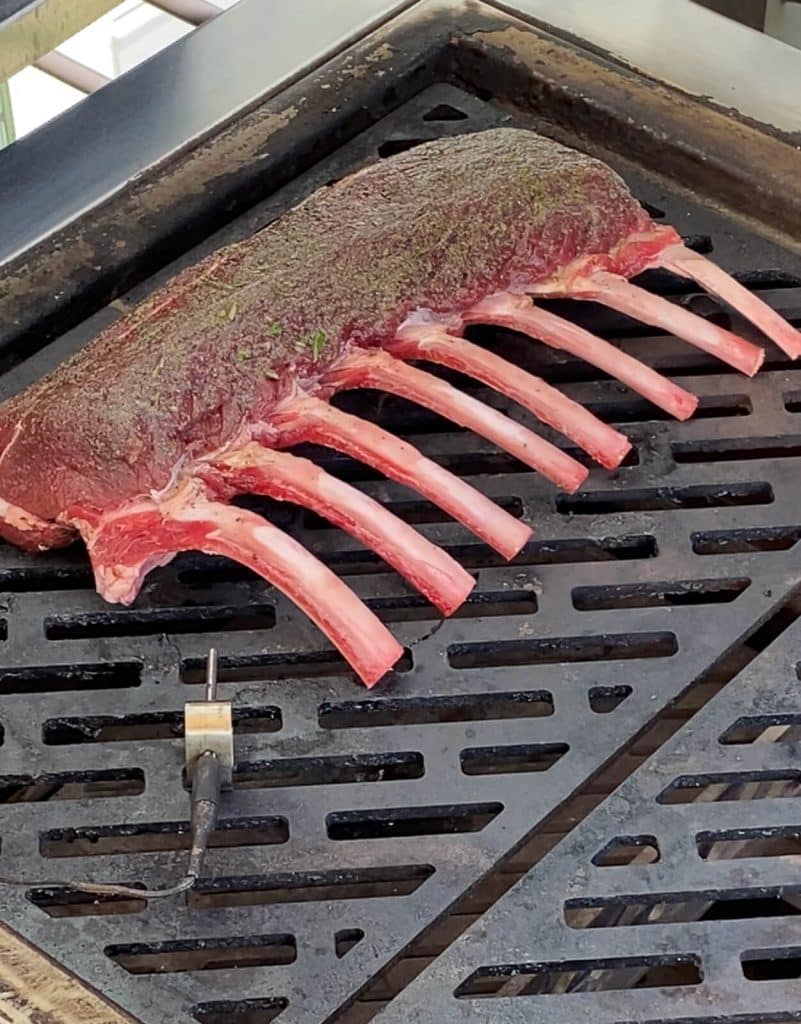 rack of venison over indirect heat on a grill