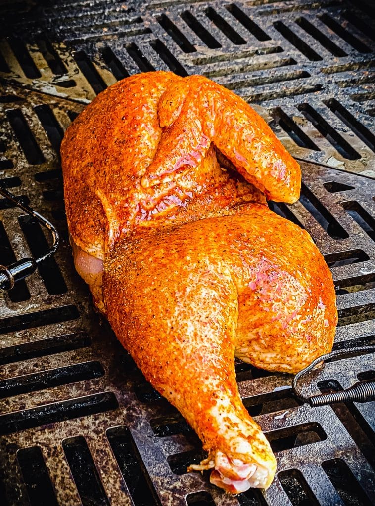chicken roasting on the grill