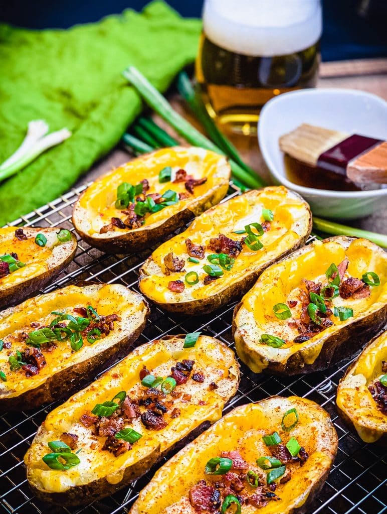 loaded baked potato skins on a cooling rack