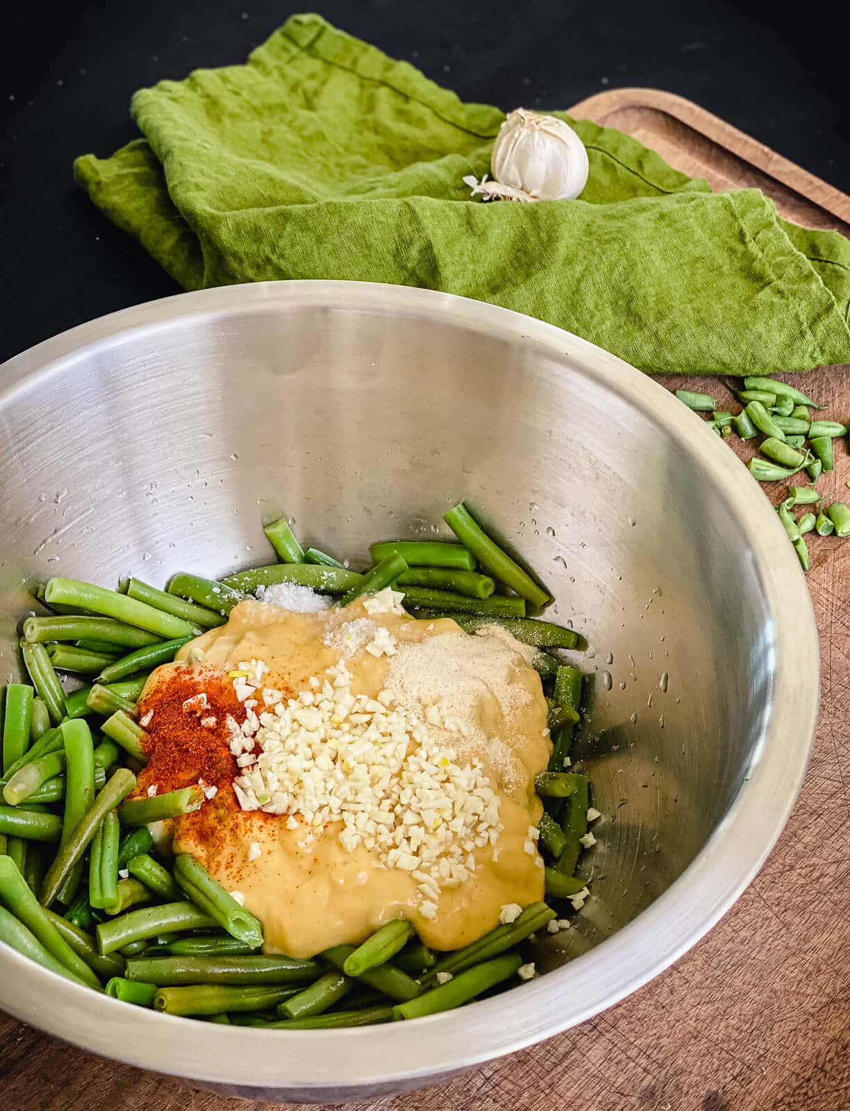 green beans with celery soup in a mixing bowl