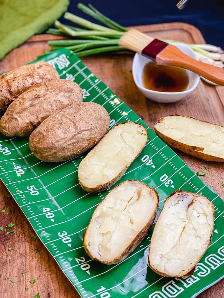 potatoes cut in half on a platter