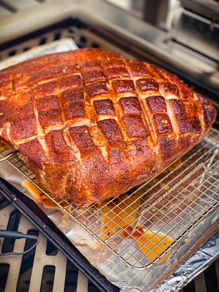 pork butt on the grill with temperature probe