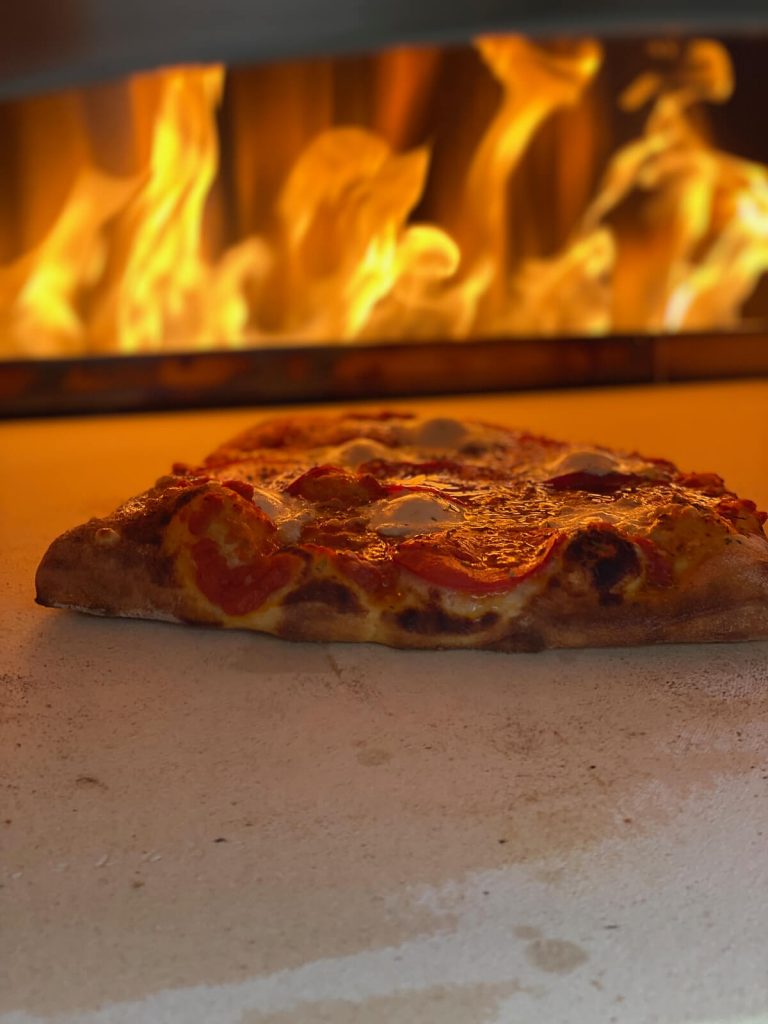 pizza cooking in kalamazoo outdoor pizza oven