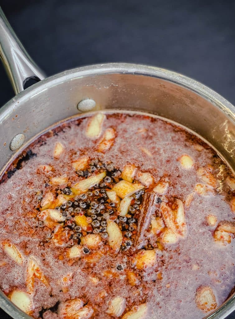 chicken brine recipe ingredients in a saucepan