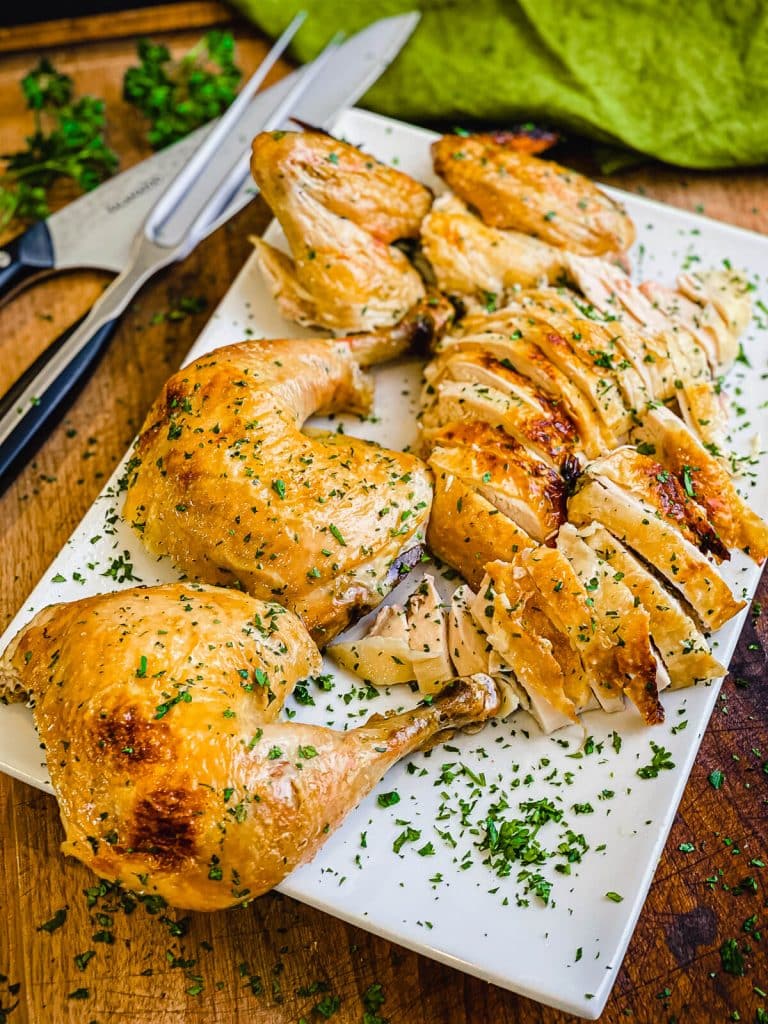 brined and roasted chicken on a platter