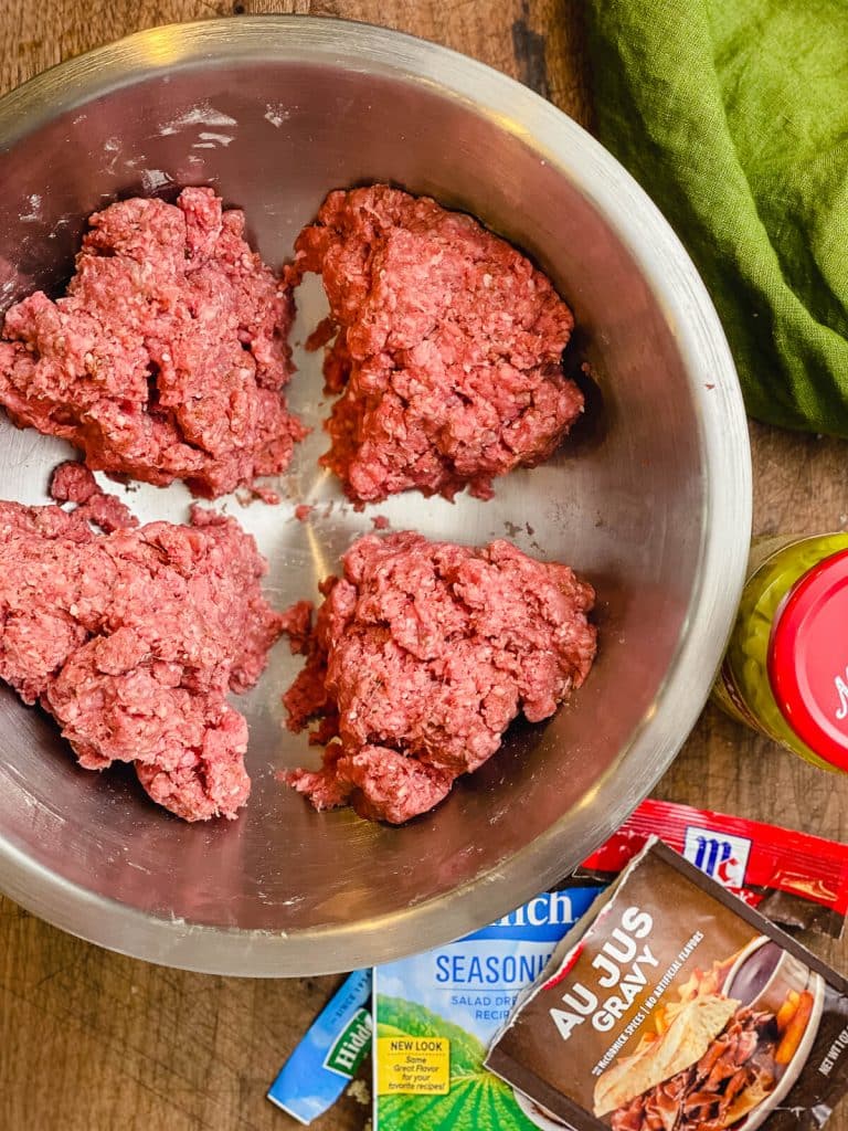 ground chuck divided into equal portions for mississippi pot roast burgers