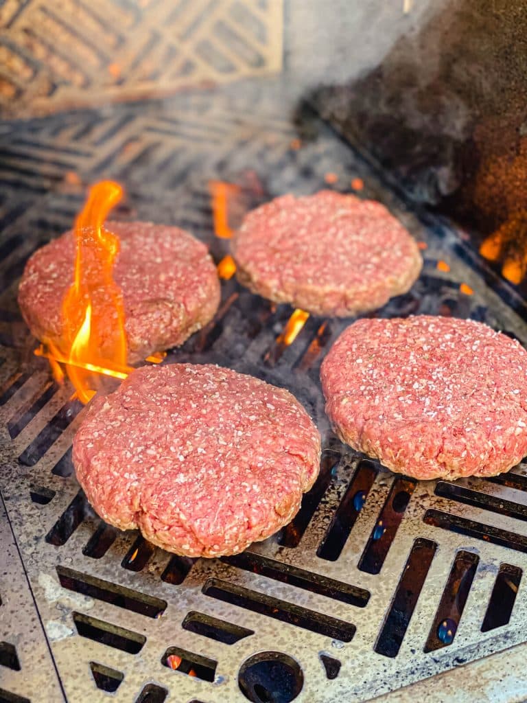 Mississippi pot roast burgers on a grill