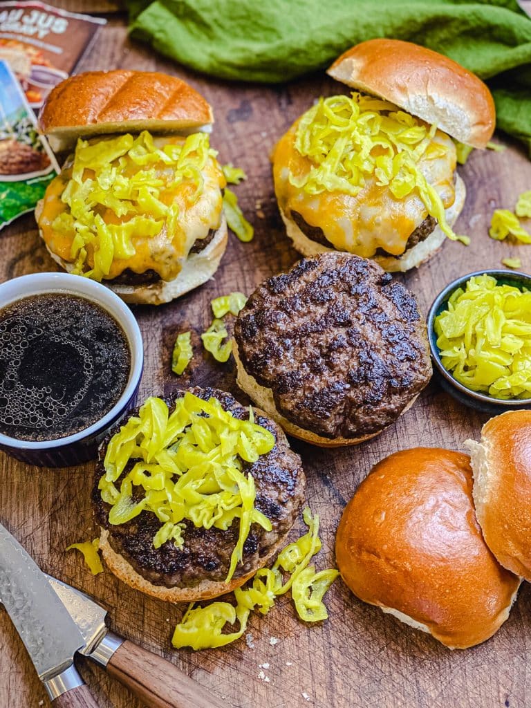 Mississippi pot roast burgers sitting with au jus