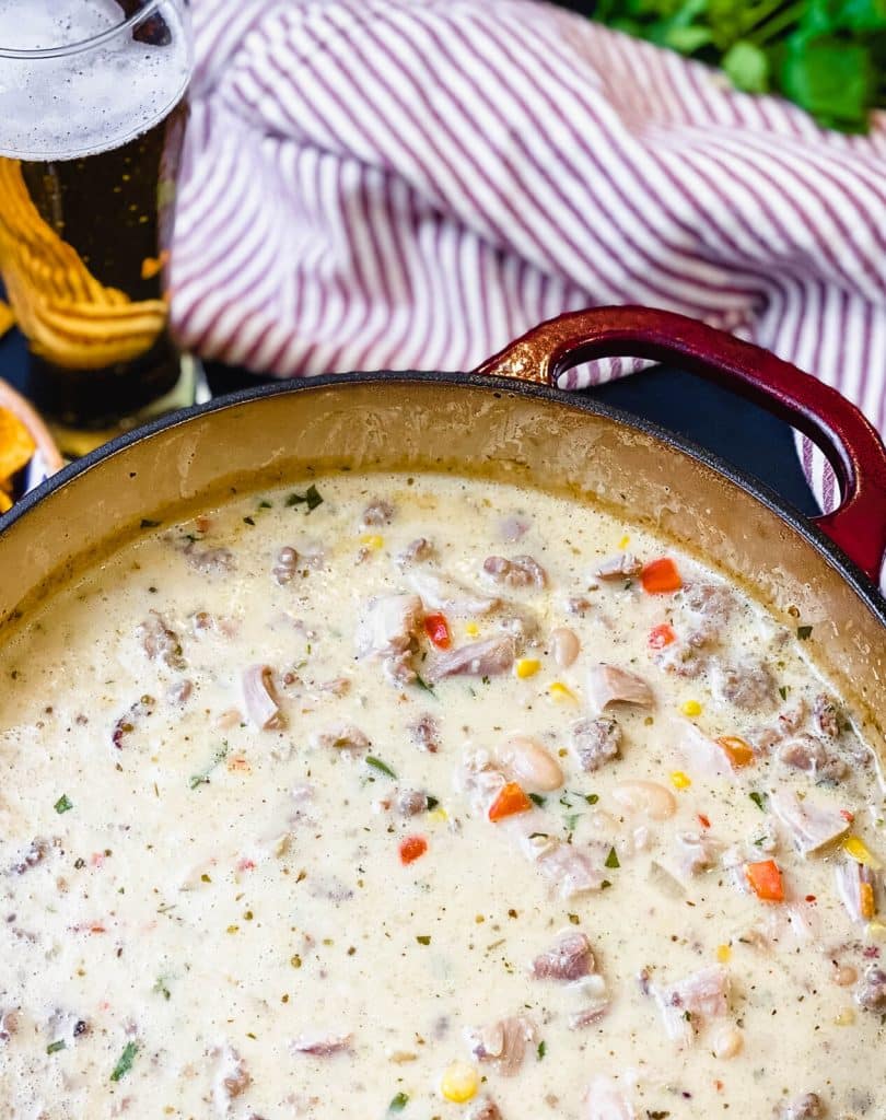 close up of a ducth oven filled with smoked white chicken chili