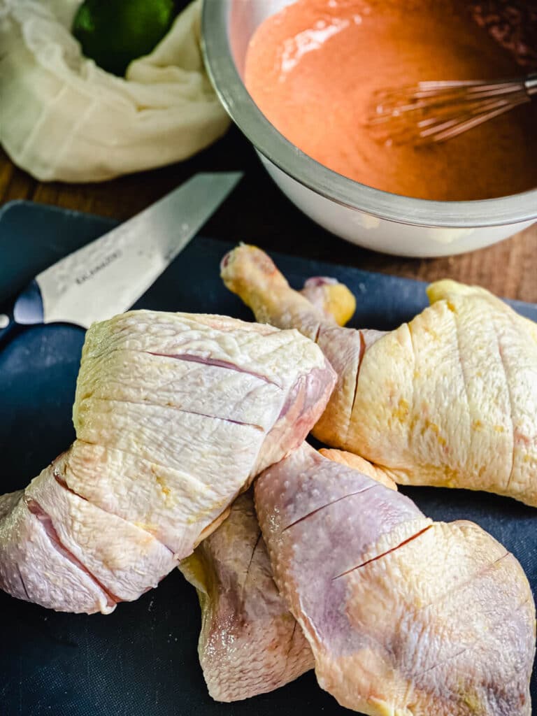chicken with slices for marinade