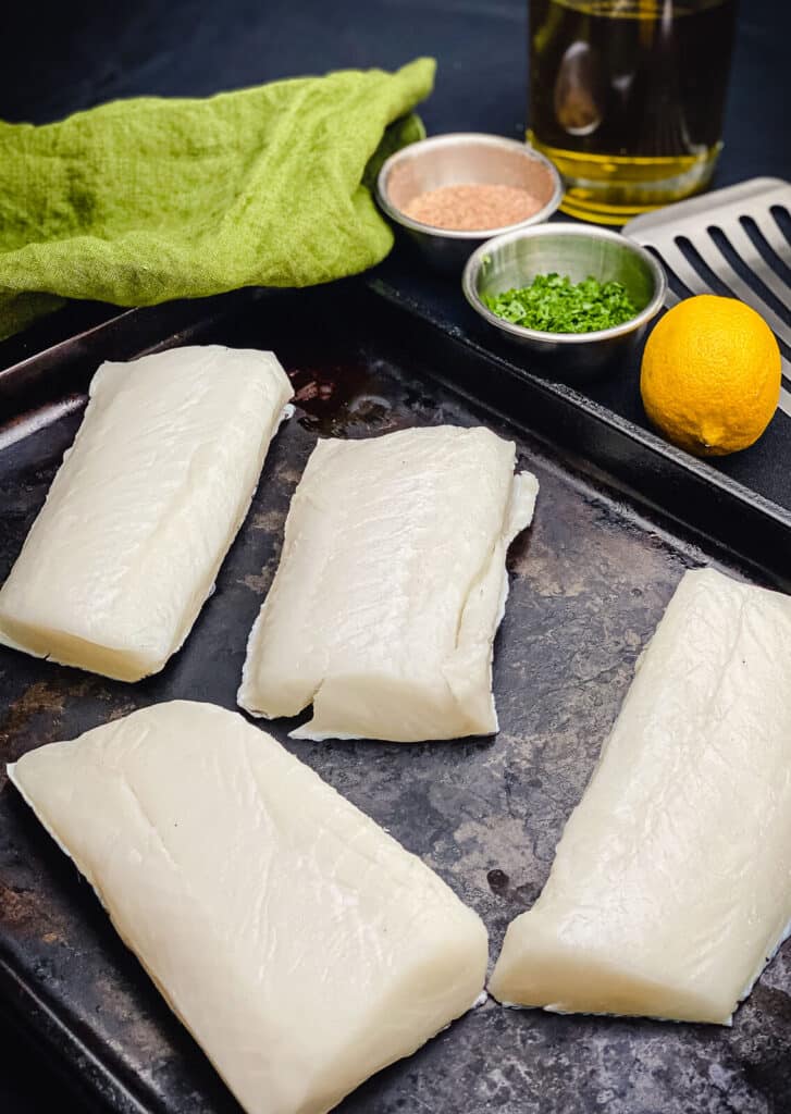 chilean sea bass on a baking sheet