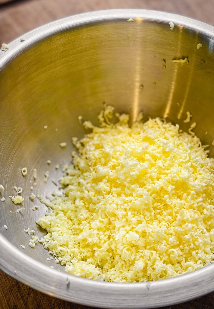 grated butter in a mixing bowl