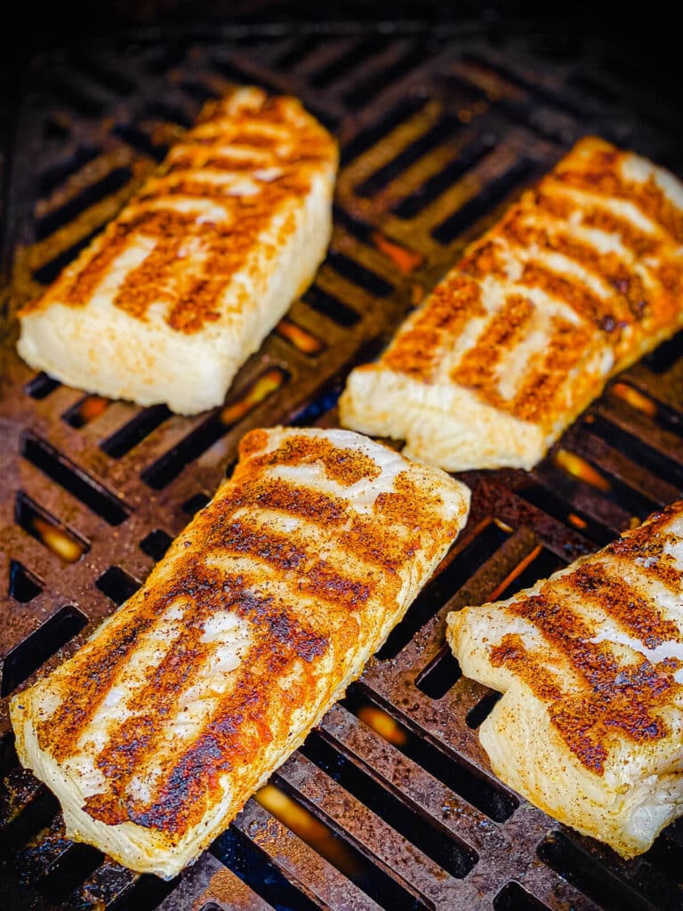 grilled chilean sea bass with grill marks on a grill