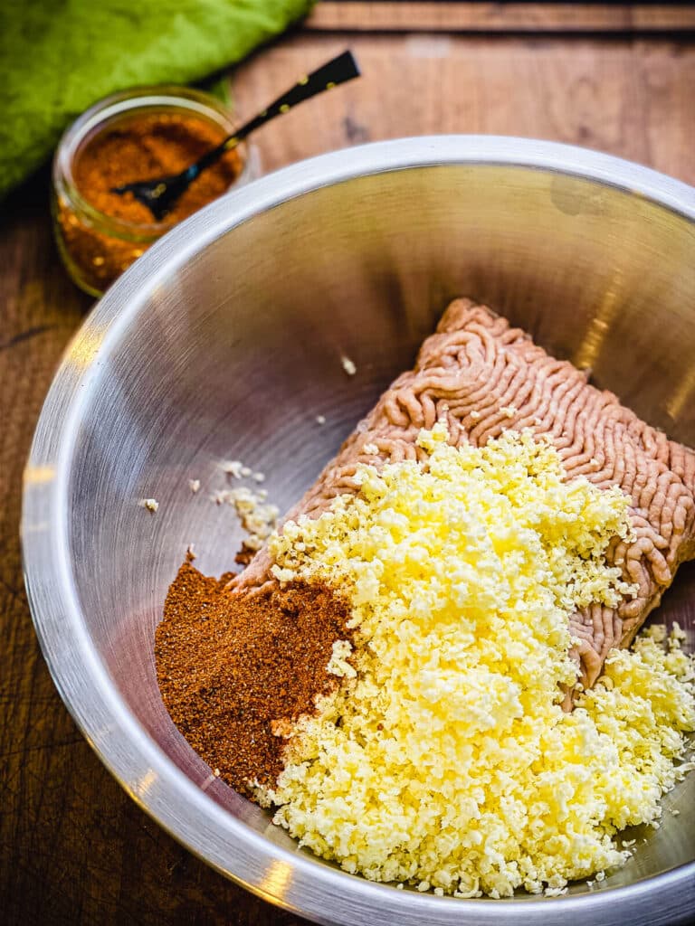 ingredients for Nashville hot chicken burgers in a mixing bowl