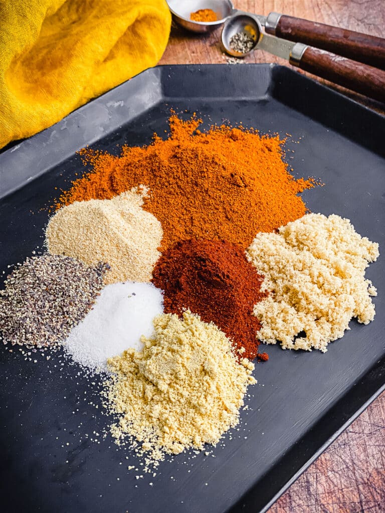 ingredients for Nashville hot seasoning on a black plate