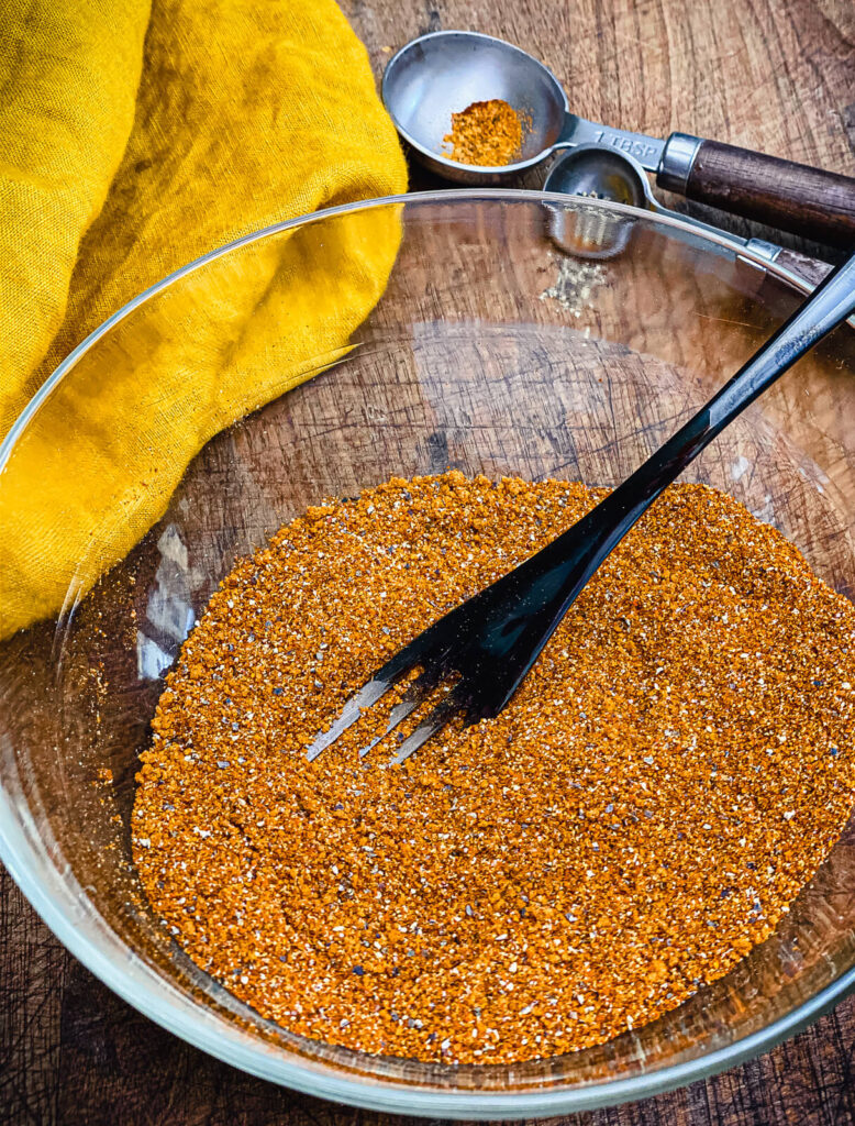 Nashville hot seasoning in a bowl with a fork