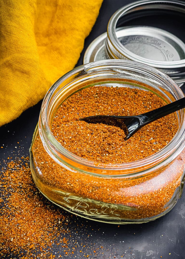 Nashville hot seasoning in a jar with a spoon