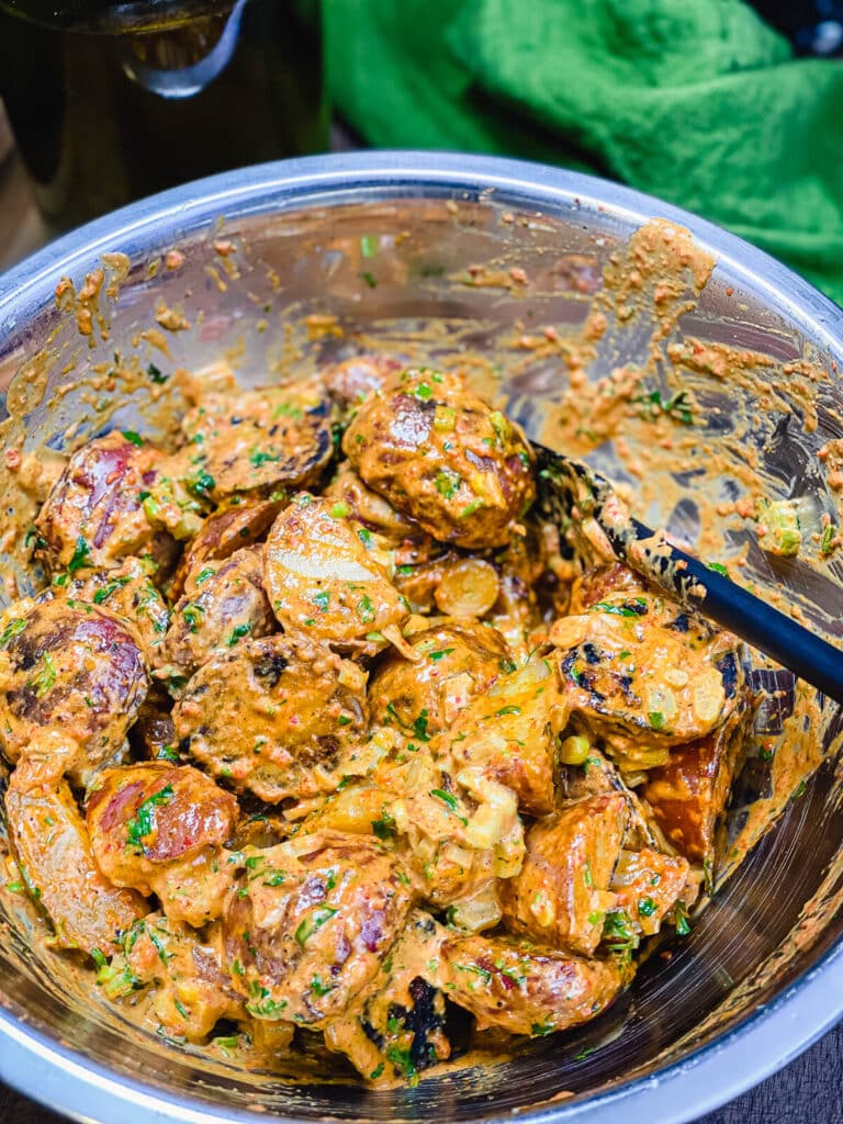 mixing bowl of grilled potato salad