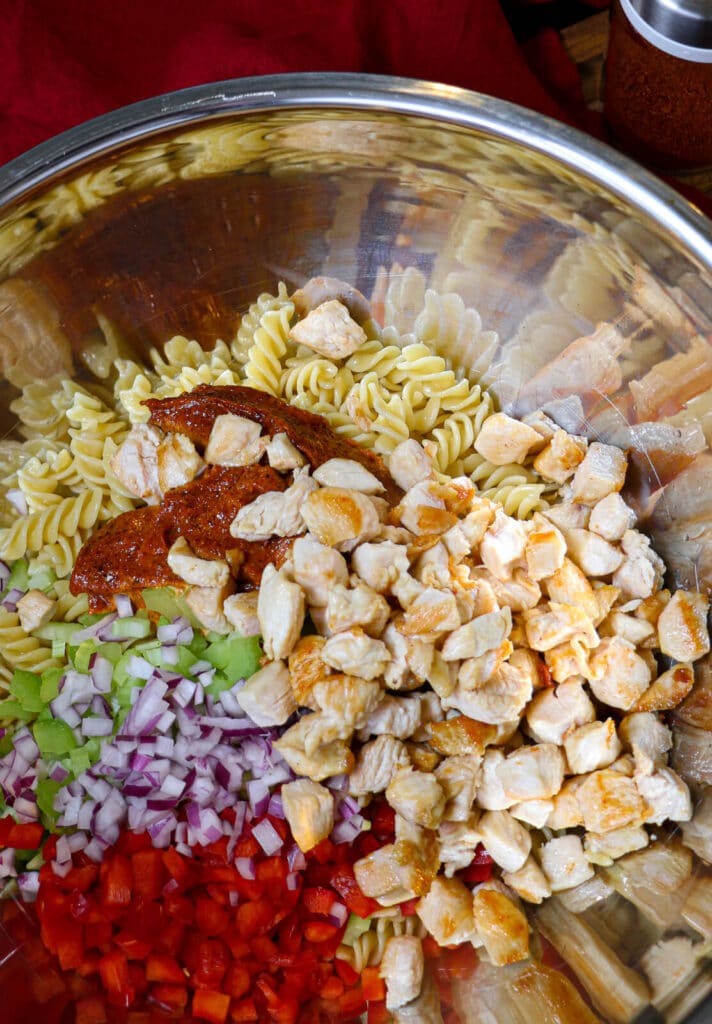 ingredients for Nashville hot chicken pasta in a bowl