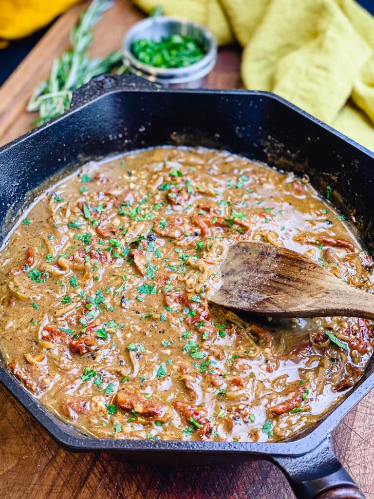 sun dried tomato sauce in a cast iron pan