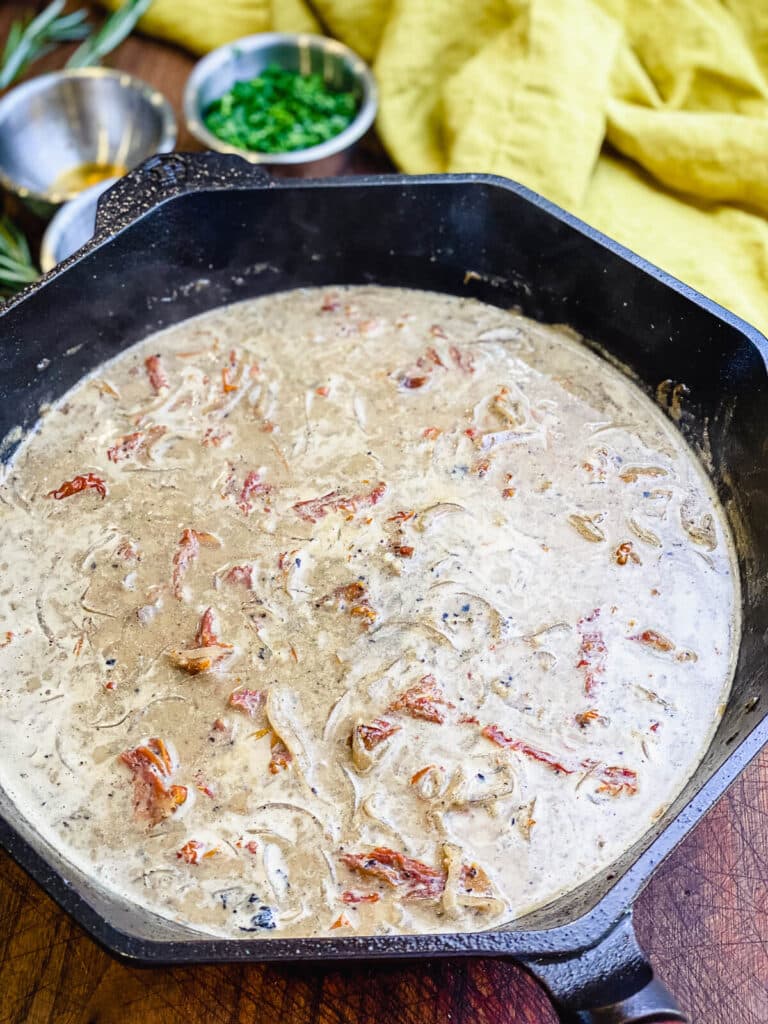 sun-dried tomato sauce in a cast iron pan