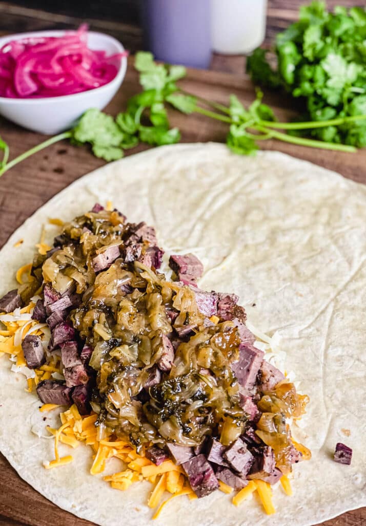 steak quesadilla being assembled