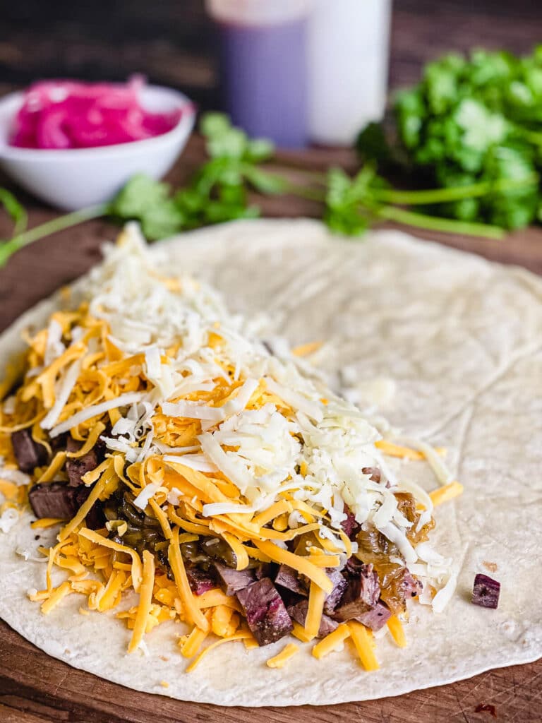 leftover steak quesadilla being assembled