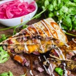 steak quesadilla with pickeled red onions and cilantro