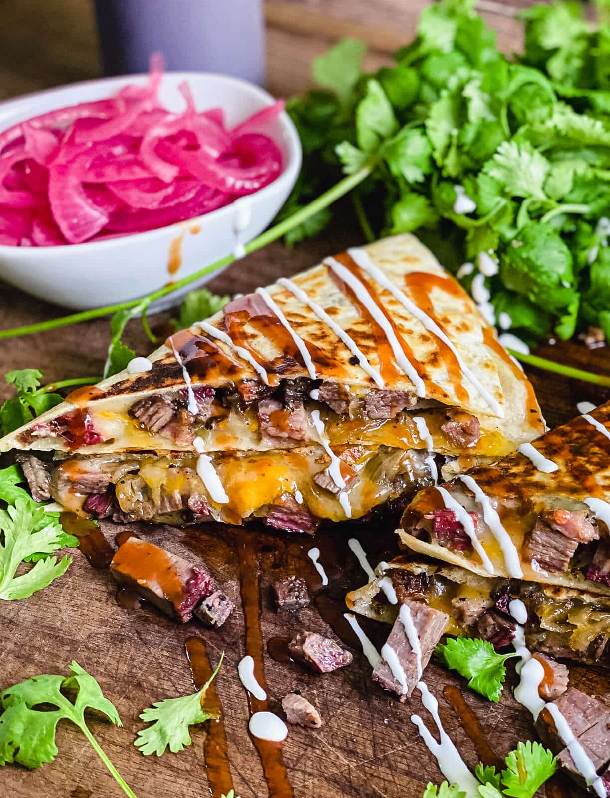 steak quesadilla with pickeled red onions and cilantro