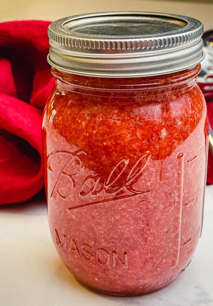 mason jar full of strawberry puree