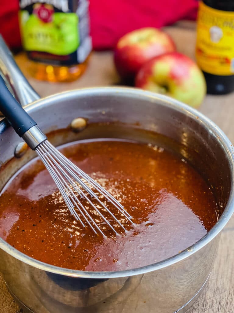 apple whiskey bbq sauce in a saucepan