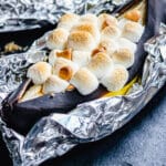 grilled banana split topped with marshmallows
