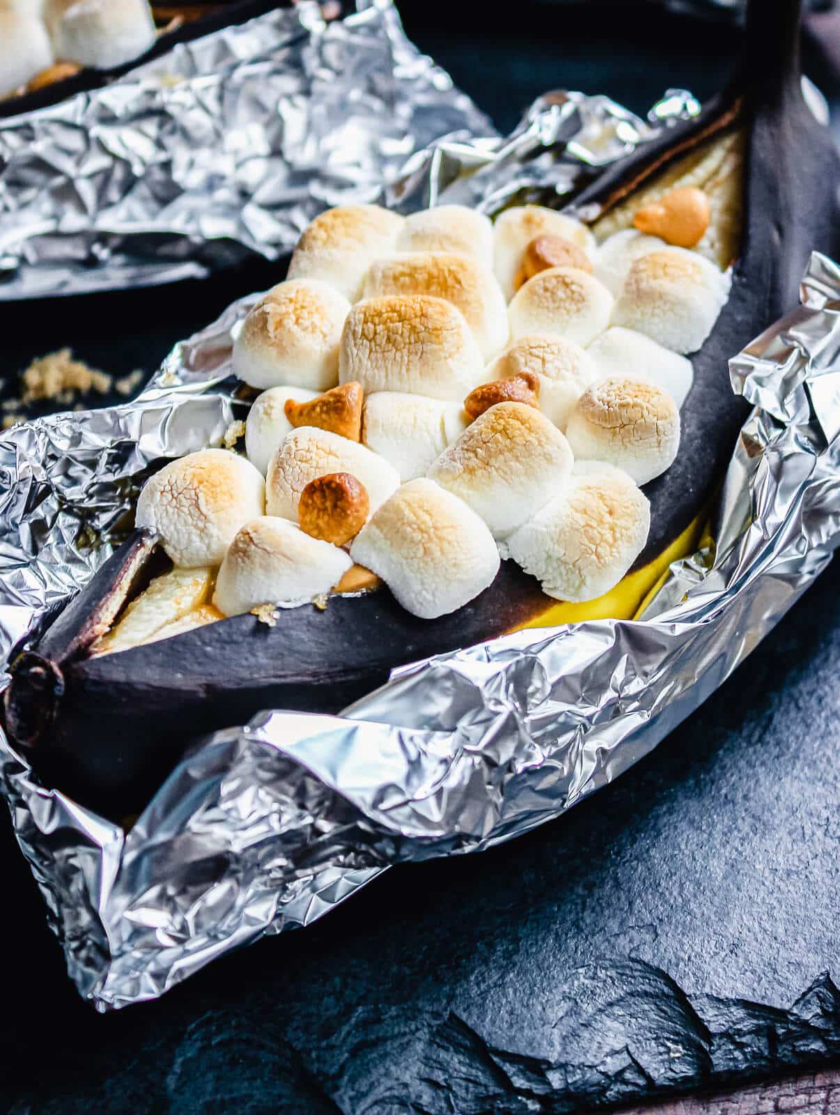 grilled banana split topped with marshmallows