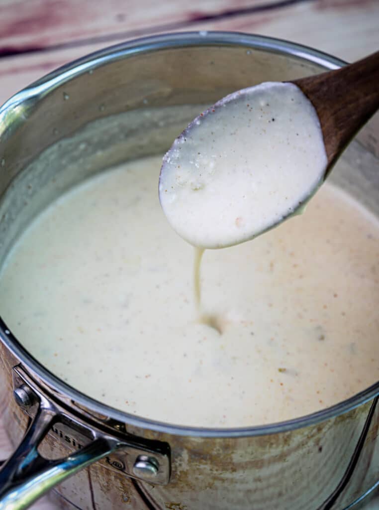 melted queso in a saucepan