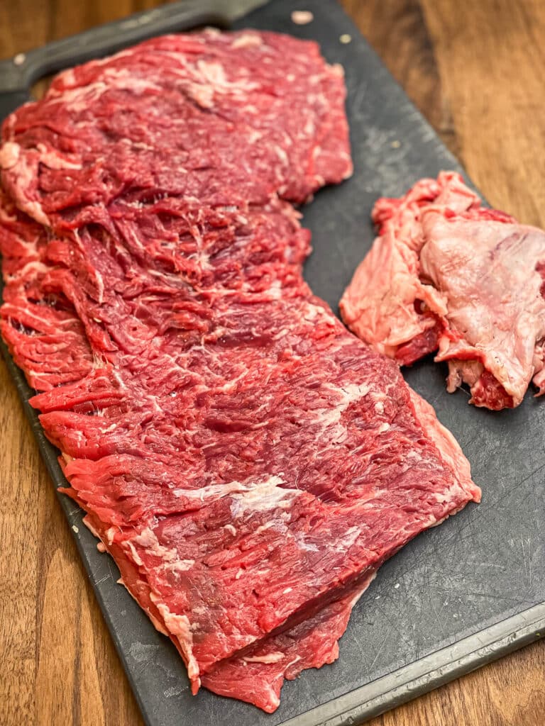 trimmed flap meat on a cutting board