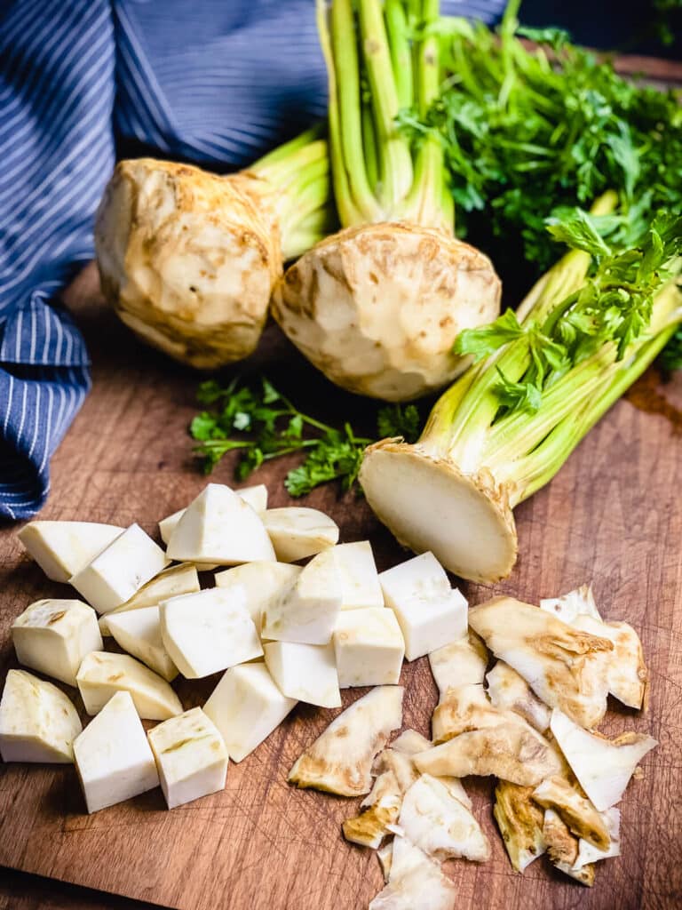 celery root diced up on a cutting board