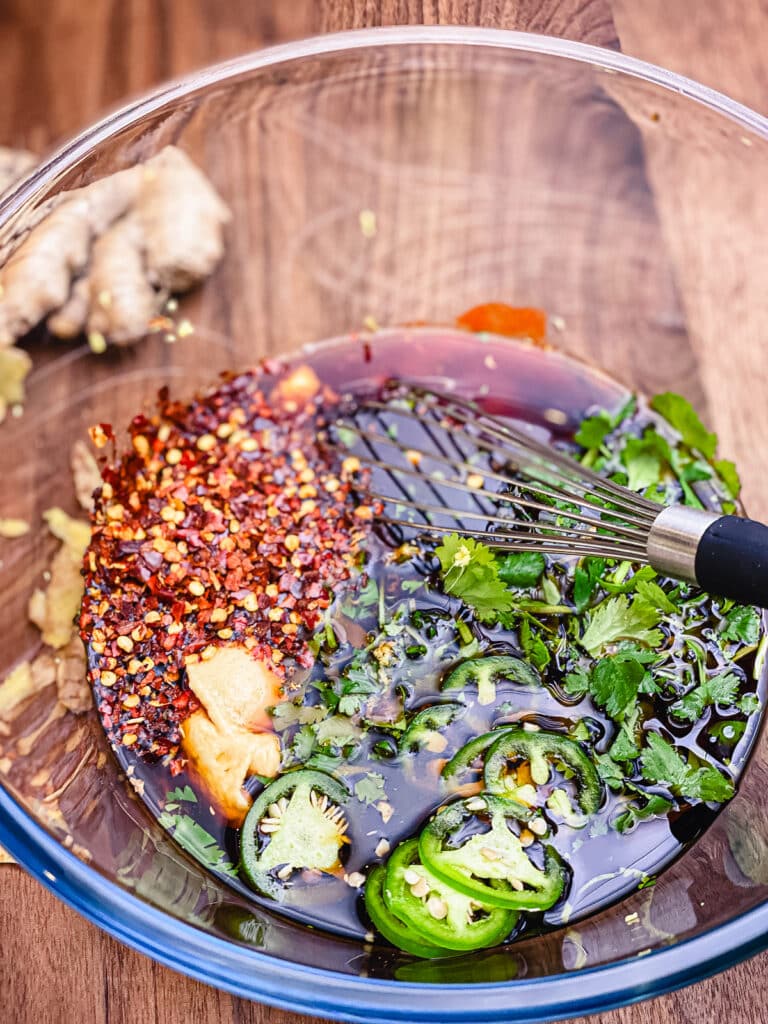 beef marinade ingredients in a glass bowl