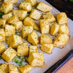 roasted celery root chunks on a baking sheet