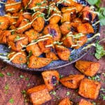 roasted sweet potatoes and avocado cream on a plate