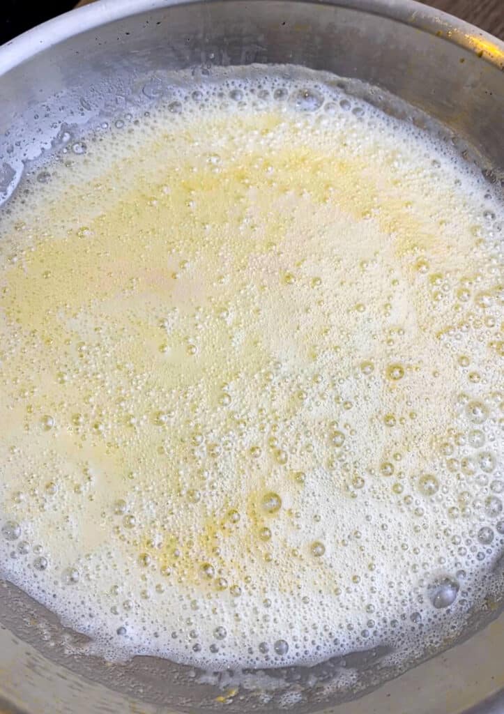 butter foaming in a pan