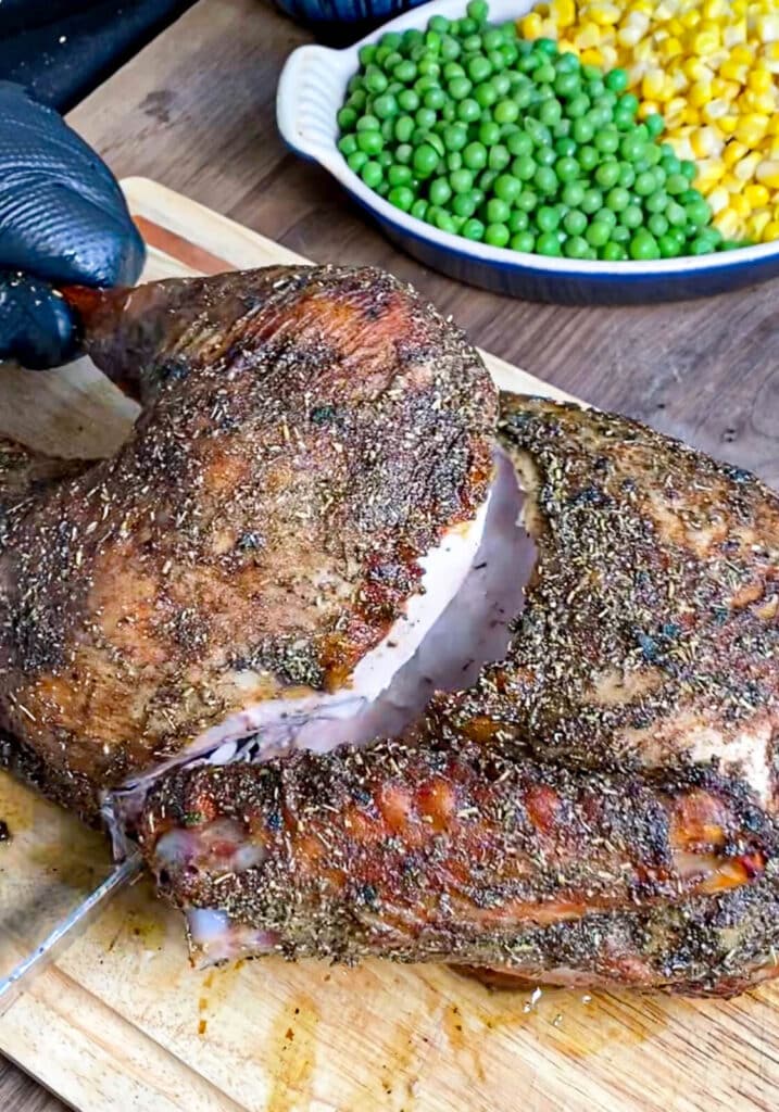 separating a thigh and leg portion from a roasted turkey