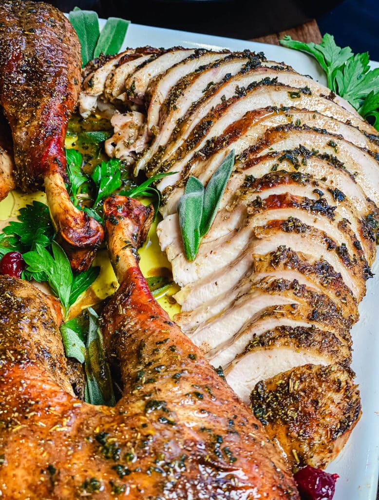 sliced roasted turkey breast on a platter