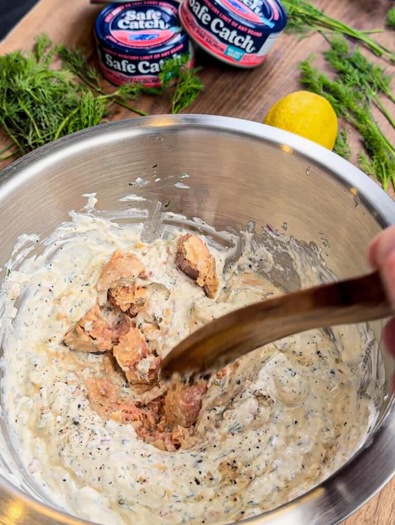 salmon being folded into smoked salmon dip