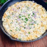 smoked salmon dip in a black skillet