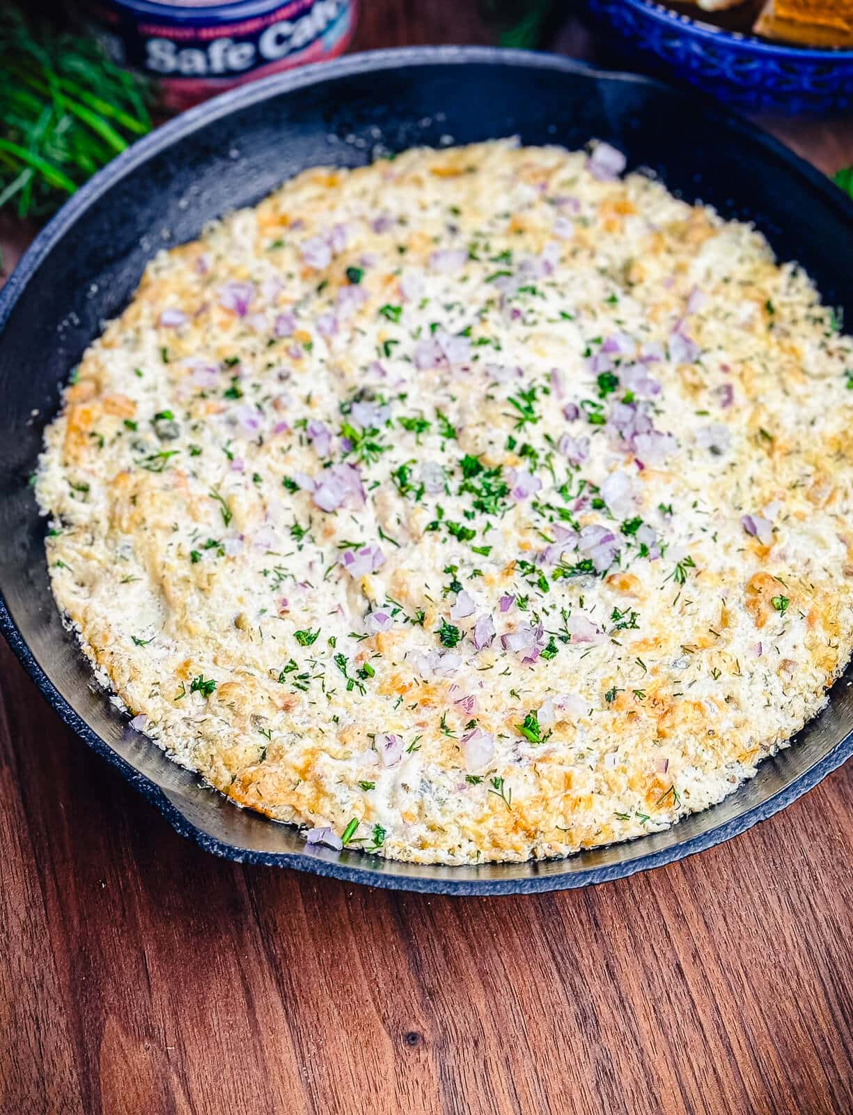 smoked salmon dip in a black skillet