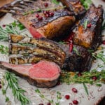 platter with grilled lamb chops and pomegranate seeds